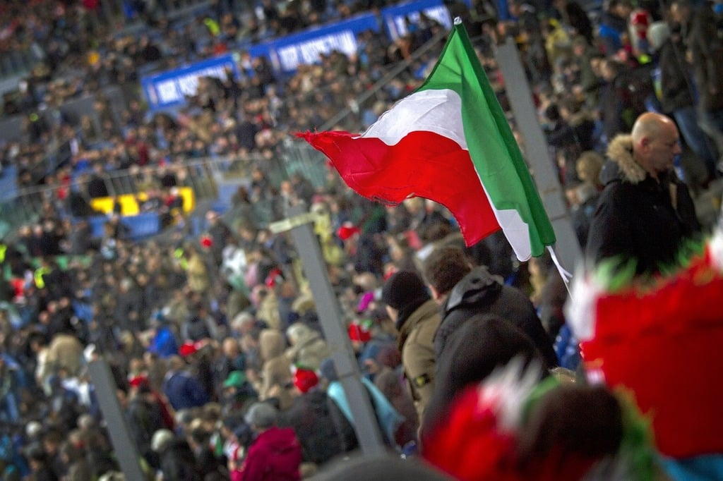 A crowd of people standing around a stadium in Italy (Photo from Pixabay)